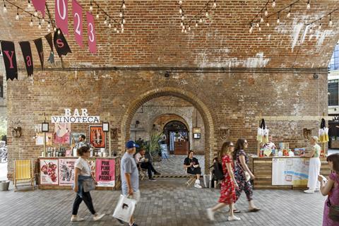 People walking through Borough Yards, London